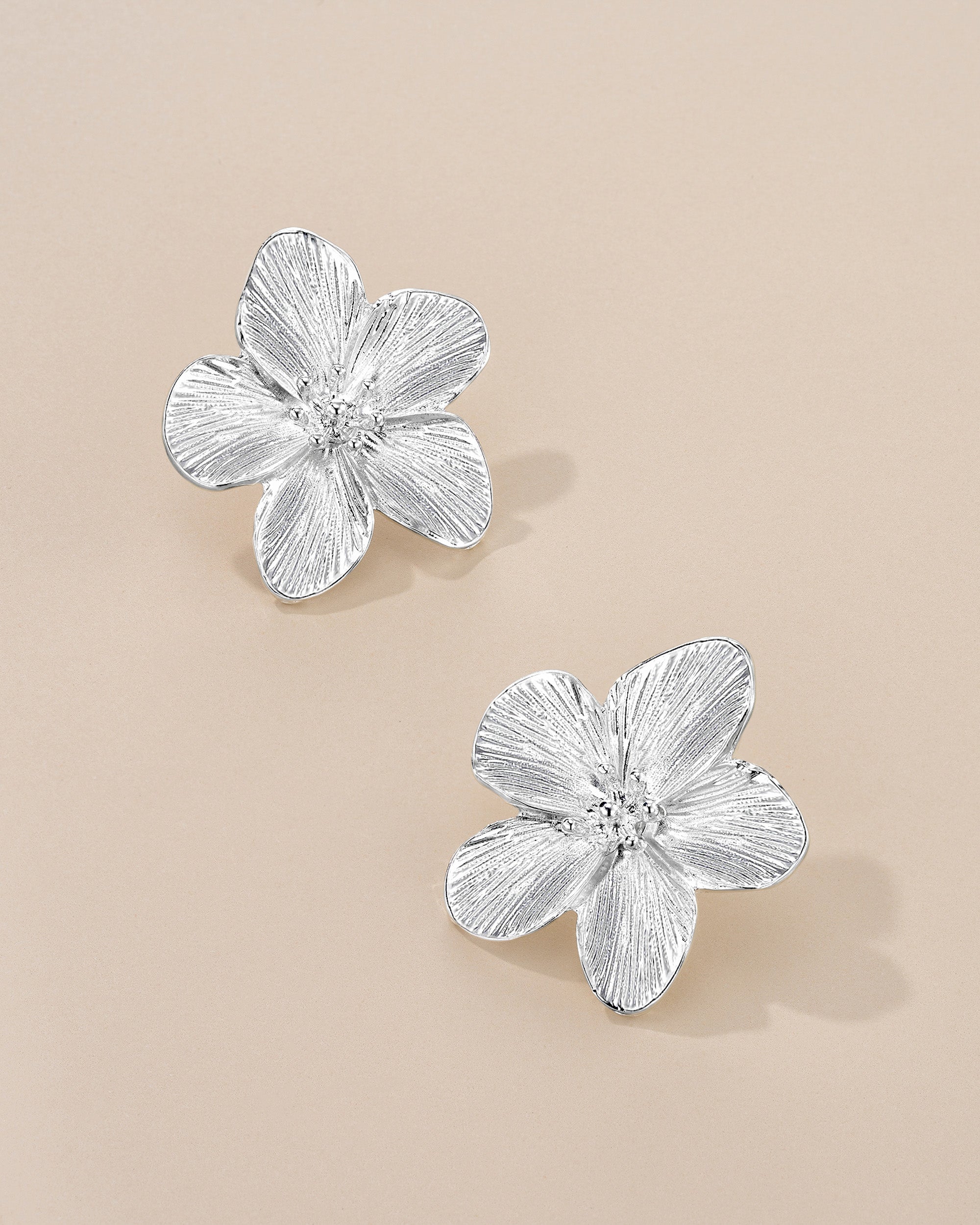 Blooming Floral Earrings In Silver Tone
