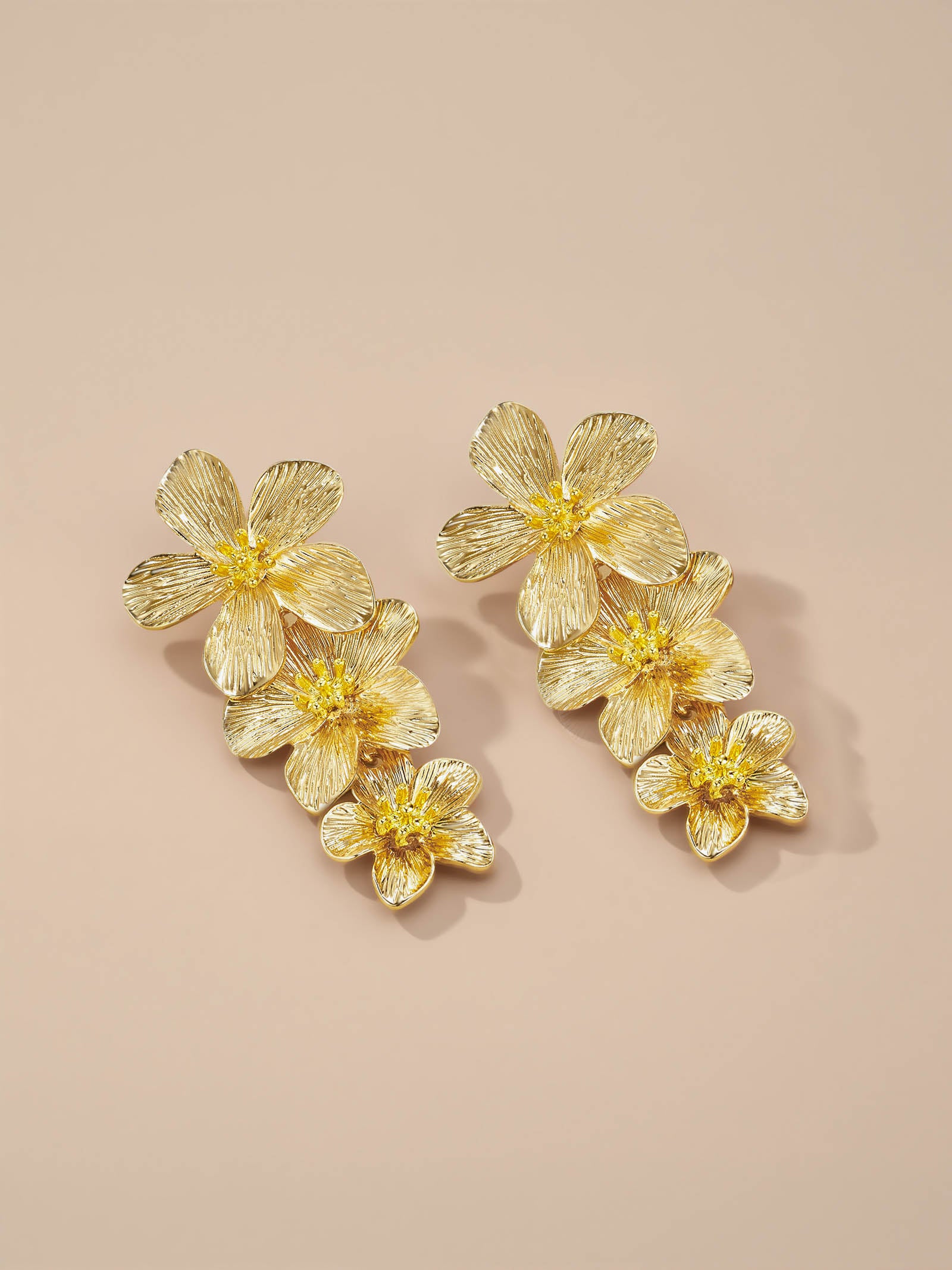 Three Tier Floral Dangle Earrings In Gold Tone