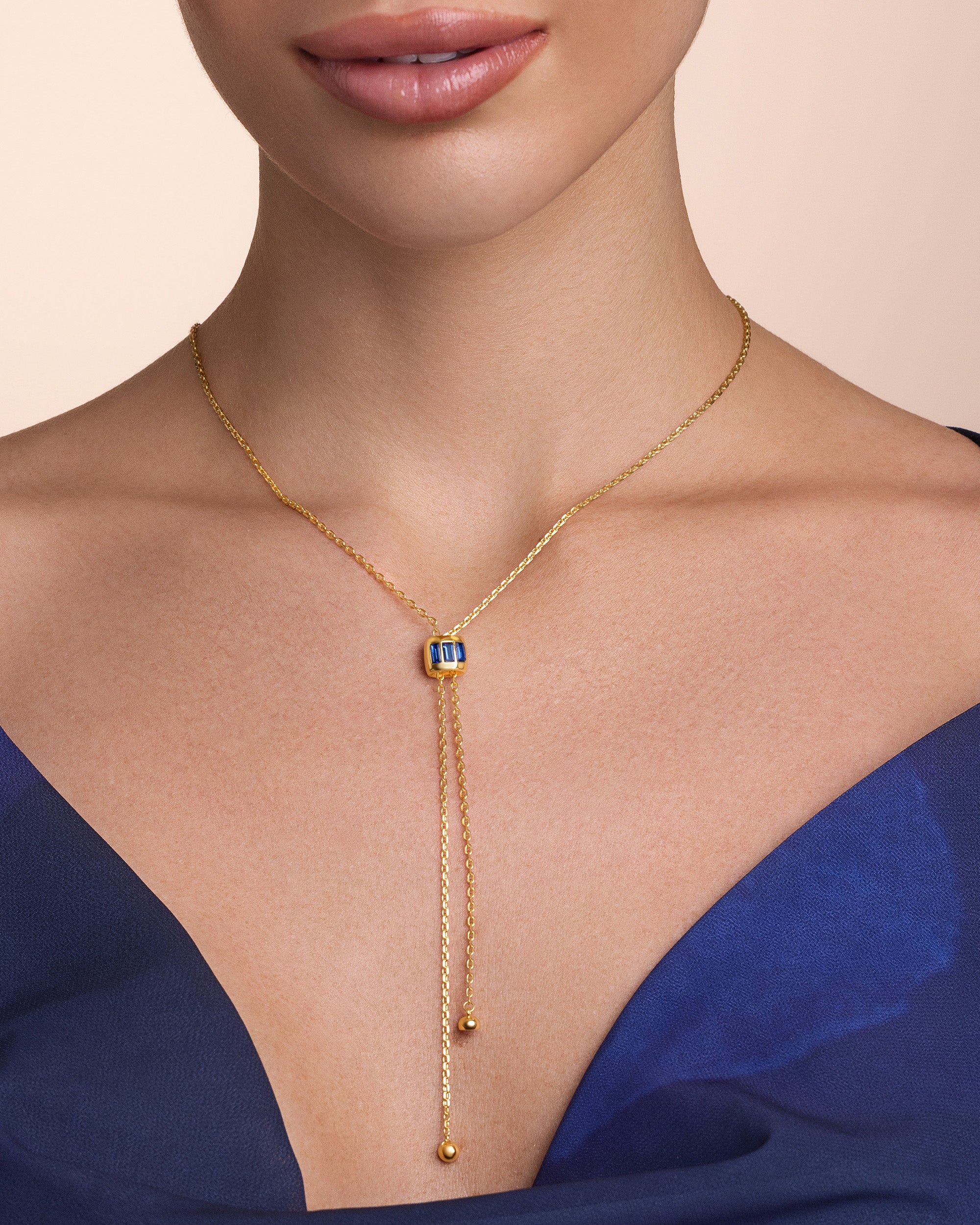 Sapphire Style Pendant Lariat Necklace In Gold Tone