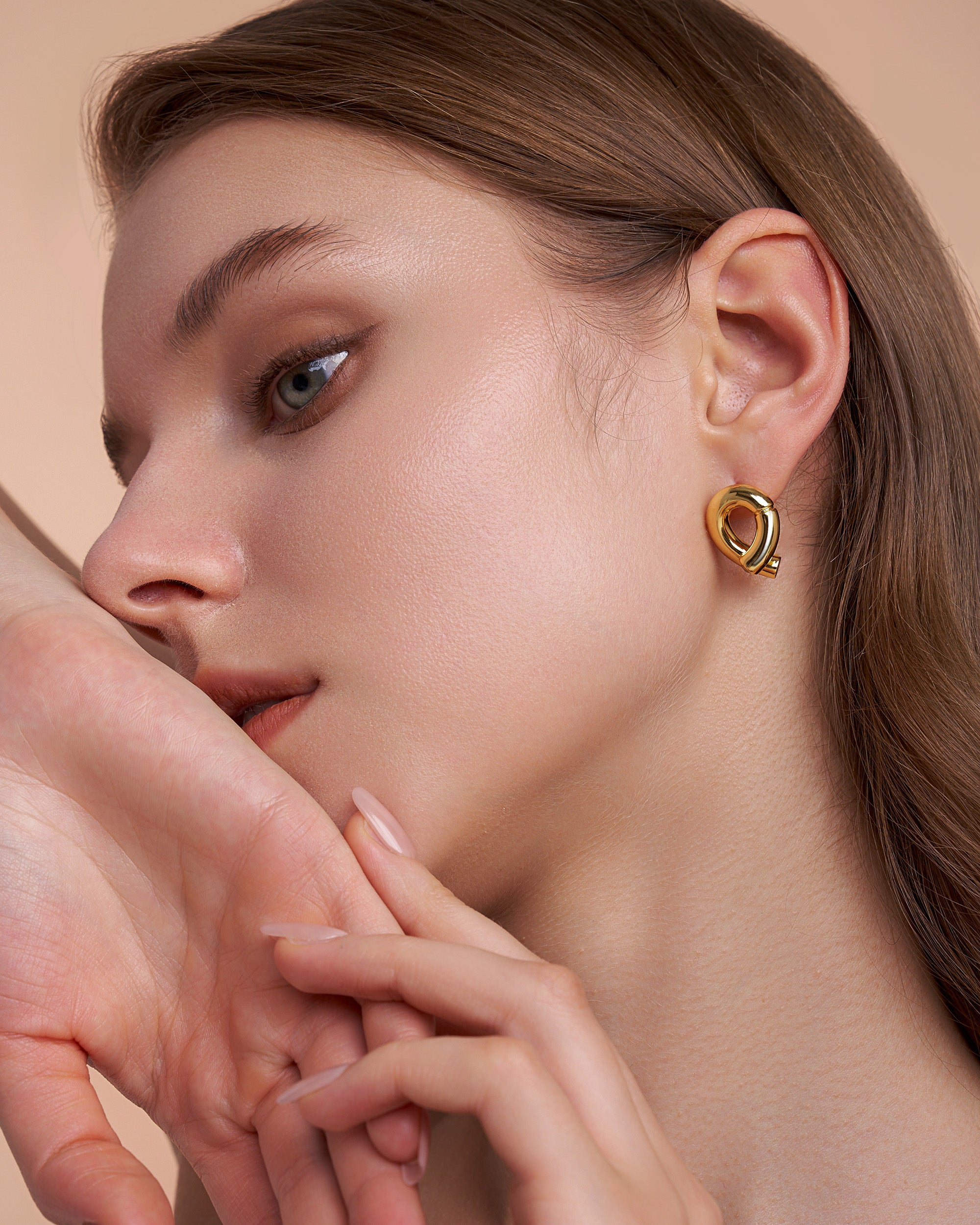 Knot Loop Stud Earrings In Gold Tone With Clear CZ Accent