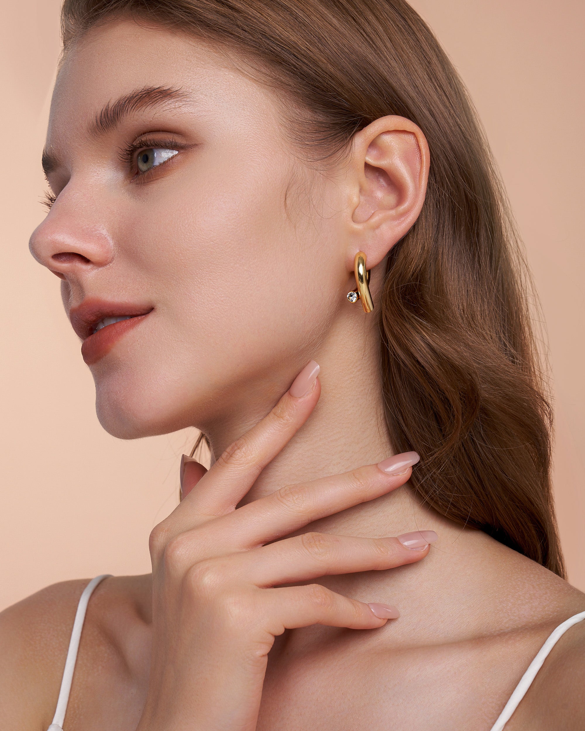 Knot Loop Hoop Earrings In Gold Tone With Clear CZ Accent
