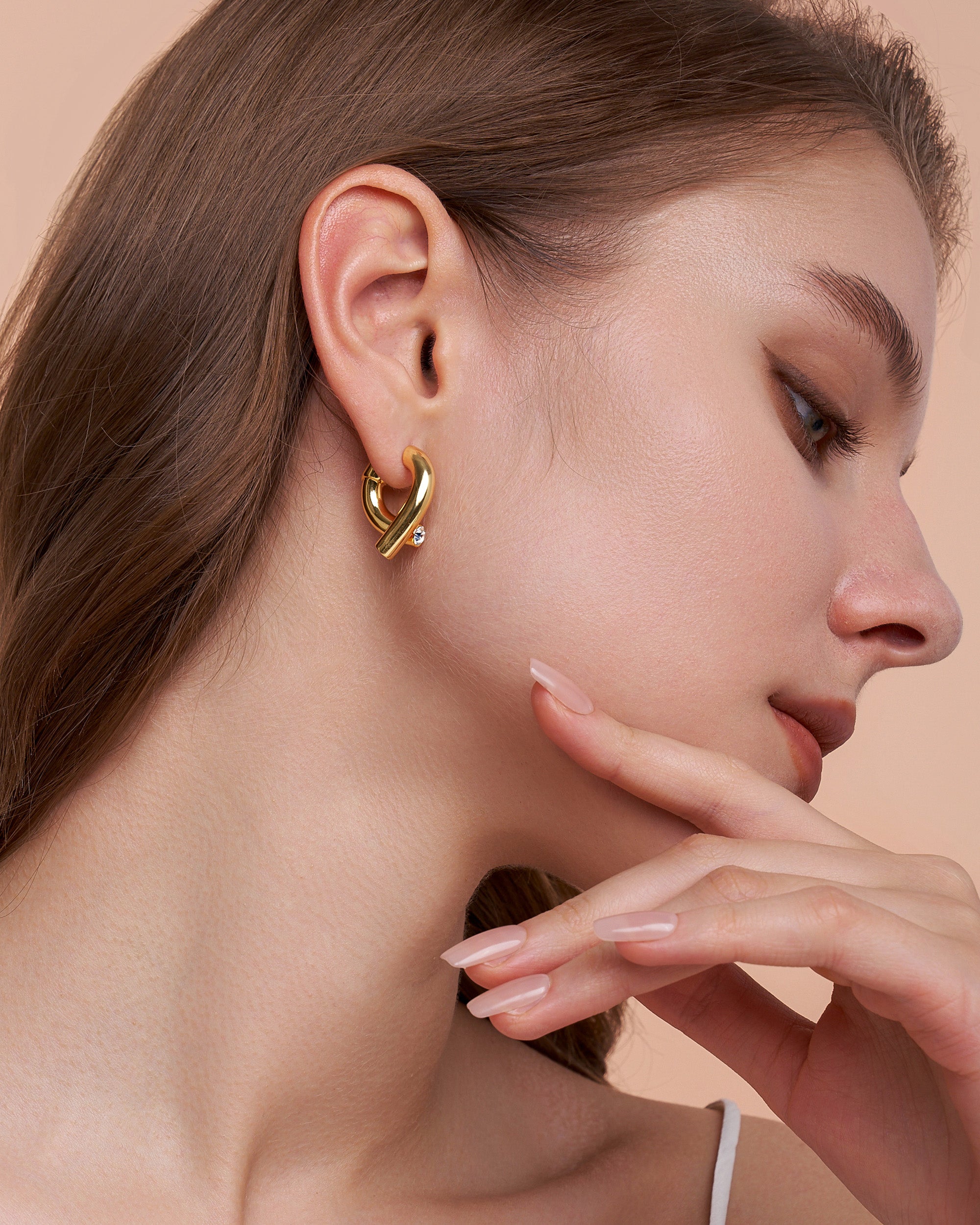 Knot Loop Hoop Earrings In Gold Tone With Clear CZ Accent