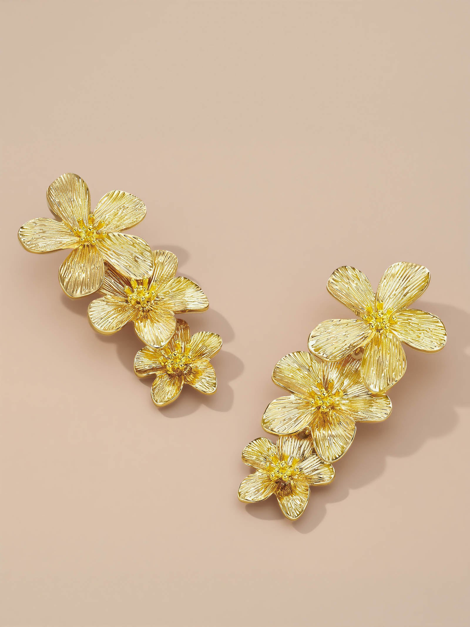 Three Tier Floral Dangle Earrings In Gold Tone