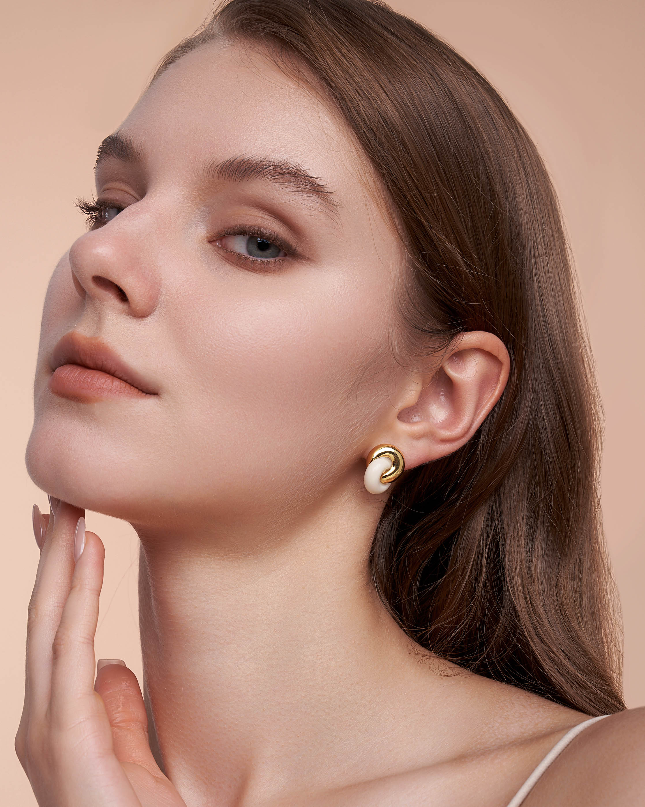 Twist Interlock Stud Earrings In Gold Tone Cream Enamel Stone Style
